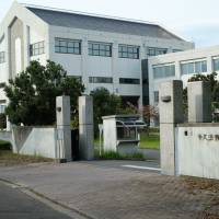 The East Japan Immigration Control Center in Ushiku, Ibaraki Prefecture. Many employees at the center are hired (by the Ministry of Justice) from the economically depressed area surrounding the facility. During the hiring process, they are often promised an eventual transfer to Tokyo. \"I don\'t think about the political implications of my work,\" said one administrative employee in the center\'s detention section. \"Nobody here does.\" | DREUX RICHARD