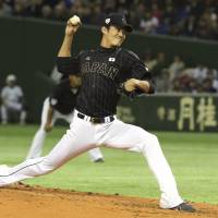 Not his best day: Japan starter Shintaro Fujinami gave up five hits and four runs in four innings on Sunday. | AP