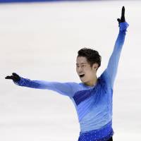 A night to remember: Daisuke Murakami dazzles the fans at Namihaya Dome during Saturday\'s free program. Murakami won the men\'s competition with 246.07 points. | KYODO