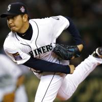 Quick exit: Seattle Mariners right-hander Hisashi Iwakuma, who gave up five runs, worked four innings on Friday.  | REUTERS