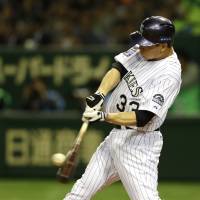 Game highlight: Justin Morneau hits a two-run home run in the second inning against Samurai Japan.  | AP