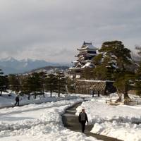 Into the white: A stroll around the formal garden surrounding Matsumoto Castle, Nagano Prefecture, can help revive flagging spirits. | MARK BRAZIL