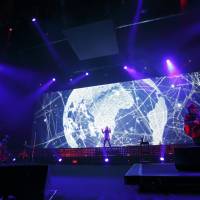 Anniversary special: The lights kick up as TM Network beings its show at Tokyo International Forum\'s Hall A on Dec. 10. | AVEX ENTERTAINMENT INC.; PHOTOGRAPH BY KAORU ABE