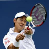 Kei Nishikori plays a shot during his U.S. Open final match against Marin Cilic in September. | REUTERS