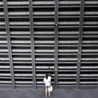 A girl reads a file in the Nanking Massacre Memorial Hall in the city now known as Nanjing in China\'s Jiangsu province. | AFP-JIJI