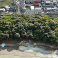 The ancient Tannowa Nisanzai Kofun burial mound is seen in the town of Misaki, Osaka Prefecture, on Friday. | KYODO