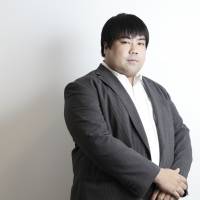Man in charge: Asobisystem President Yusuke Nakagawa likes the fact that Tokyo\'s Harajuku neighborhood has given birth to so much culture in the past few years. | CHIEKO KATO