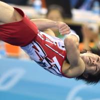 Nobody does it better: Legendary gymnast Kohei Uchimura performs at the world championships in October in Nanning, China. | AFP-JIJI