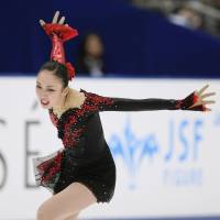 Captive audience: Rika Hongo competes to \"Carmen\" during Sunday\'s free skate at Big Hat in Nagano. Hongo took second at nationals with 188.63 points. | KYODO