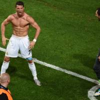 So macho: Cristiano Ronaldo celebrates after scoring in Real Madrid\'s Champions League final win over Atletico Madrid in Lisbon in May. | AFP-JIJI