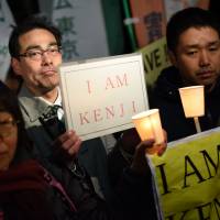 At a somber demonstration Wednesday evening in front of the prime minister\'s office, people made speeches calling for the release of Islamic State captive Kenji Goto on journalists. | FINBAR O\'MALLON