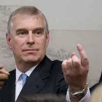 Prince Andrew gestures at a meeting with business leaders at the World Economic Forum in Davos, Switzerland, on Thursday. He reaffirmed denials that he had sex with an underage teenage girl. Prince Andrew speaks out on underage sex allegation
