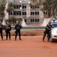 French soldiers of the European force in Central Africa (Eufor RCA) patrol Tuesday in Bangui while negociations were underway to free a French charity worker and a churchman, who were seized Monday in an area of the city controlled by anti-balaka fighters. A French female aid worker was reported freed Friday. Kidnapped French female aid worker freed in Central African Republic