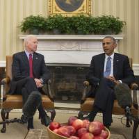 U.S. President Barack Obama meets Wednesday at the White House with Vice President Joe Biden (center) and Secretary of State John Kerry. Obama condemned the \"horrific shooting\" at the office of French magazine Charlie Hebdo in Paris, saying, \"the French people have stood up for the universal values that generations of our people have defended.\" | AFP-JIJI