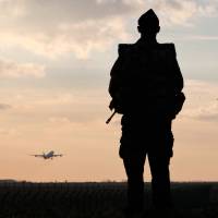 A French soldier patrols at the Roissy Charles de Gaulle airport in Roissy, north of Paris, on Saturday. | AP