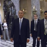 House Speaker John Boehner of Ohio walks from the House chamber on Capitol Hill Wednesday as lawmakers vote to fund the Department of Homeland Security and curb President Barack Obama\'s executive actions on immigration. | AP