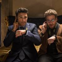 This photo released by Sony-Columbia Pictures shows James Franco (left) as Dave and Seth Rogen as Aaron in a scene from Columbia Pictures\' \"The Interview.\" Digital sales for \"The Interview\" are up to $40 million, putting the Sony Pictures release on track to eclipse \"Bridesmaids\" as the biggest online release ever. In a statement Tuesday,  Sony Pictures chief executive Michael Lynton called the total \"a significant milestone.\" | AP