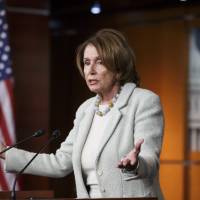 House Minority Leader Nancy Pelosi of California gestures during a Thursday news conference on Capitol Hill, where she told reporters that she disagrees with House Speaker John Boehner of Ohio on his invitation to Israeli Prime Minister Benjamin Netanyahu to address Congress without consulting the White House. Netanyahu accepts Boehner's invite to address U.S. Congress in March on Iran