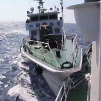 A Chinese maritime patrol ship rams a Vietnamese vessel in the South China Sea, in this grab from a video of the incident provided by the Vietnam Coast Guard. | VIETNAM COAST GUARD