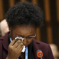 Rebecca Johnson of Sierra Leone, a health worker and survivor of Ebola, cries after delivering her testimony at the special session on Ebola of the executive board at the headquarters of the World Health Organization in Geneva on Sunday. WHO mulls reforms to repair reputation after bungling Ebola crisis