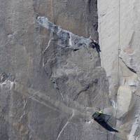 Climber Kevin Jorgeson (shirtless) climbs Pitch 17 as his partner, Tommy Caldwell, belays from below on the Dawn Wall of the El Capitan rock formation in California\'s Yosemite National Park on Monday. | REUTERS