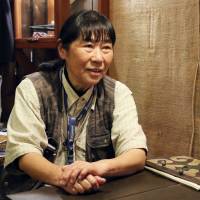 Photographer Taka Maesawa\'s 110-page photo book documents the life of the Ainu ethnic minority. | KYODO