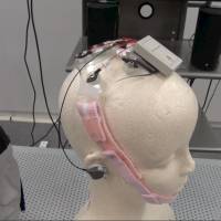 The Neurocommunicator uses a neural cap to monitor brain waves around the scalp. | KAZUHIRO KOBAYASHI