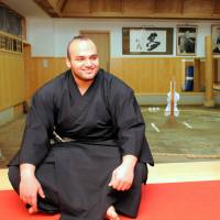 Sumo wrestler Kintaro Osunaarashi is interviewed by The Japan Times at the Otake-beya stable in Koto Ward, Tokyo, in December. | SATOKO KAWASAKI