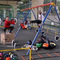 Picture of health: Trainers Chris Colucci (left) and Allan Wooding demonstrate some of the equipment used by TokyoFit, which encourages exercising outside of the gym. | &#169; TOKYOFIT