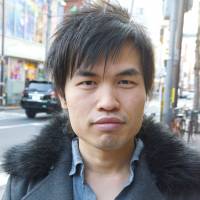 Simon Tan, English teacher, 25 (Chinese-American): When I first got here it was to improve my Japanese and stop being shy. That worked, as now I organize meetups. I don\'t break resolutions as I don\'t make many. This year I aim to get stronger &#8212; to go to the gym. Also, to do a one-hand handstand &#8212; but in fact I can do that now! | JON MITCHELL