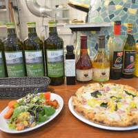 A little corny: A salad and pizza make great snacks at Mercato. | J.J. O\'DONOGHUE