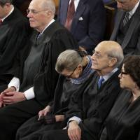 Supreme Court Justice Ruth Bader Ginsburg (center) rests during President Barack Obama\'s State of the Union address on Capitol Hill in Washington on Jan. 20. Ginsburg has a confession: She \"wasn\'t 100 percent sober\" when she fell asleep at the address last month. | AP