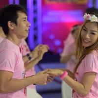 Couples take part in a dance marathon contest Friday in Pattaya, Thailand. | AFP-JIJI