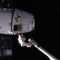 This image from NASA TV shows the SpaceX Dragon cargo ship undocking from the International Space Station on Tuesday. | AFP-JIJI