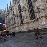 Italian soldiers patrol around the Duomo cathedral in Milan on Tuesday. | AFP-JIJI