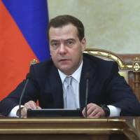 Russian Prime Minister Dmitry Medvedev chairs a meeting of the government in Moscow on Thursday. Medvedev has ordered the Energy Ministry and gas company Gazprom to work out proposals to supply gas to east Ukraine as humanitarian aid, TASS news agency reported on Thursday. | REUTERS