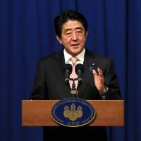 Prime Minister Shinzo Abe holds a news conference in Jerusalem on Jan. 20. | REUTERS