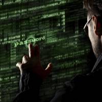 Japanese companies are allocating more money for cybersecurity, but some analysts warn they are not taking radical steps like compartmentalizing their networks to limit loss, given that breaches can never be wholly prevented. | ISTOCK