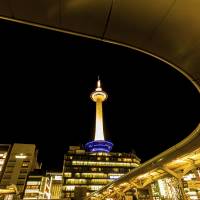 Kyoto Tower is illuminated in downtown Kyoto. A record-breaking tourism boom in the city has triggered a \"hotel war\" among luxury inn chains. | ISTOCK