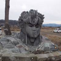 A screen grab from Youtube shows a mystery stone sculputure sitting along Chikuma River in Ueda, Nagano Prefecture. | YOUTUBE