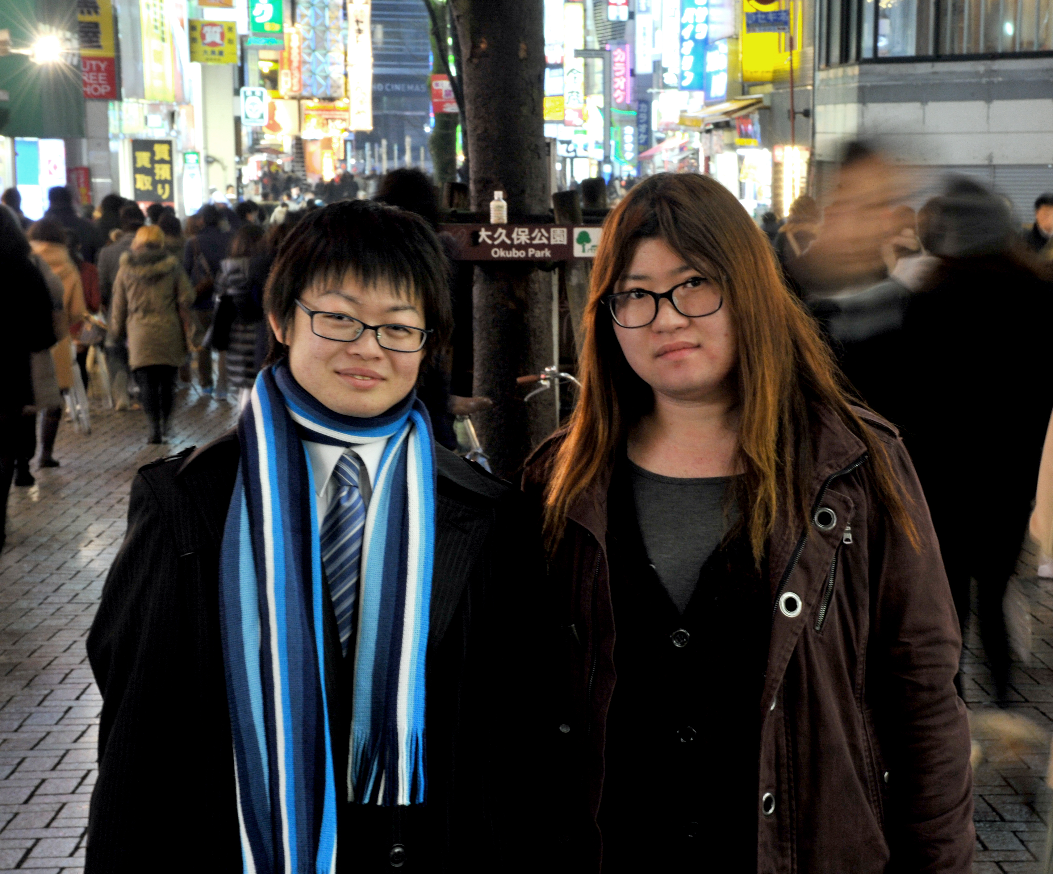 Kazuki Osawa (left), a transgender male who remains legally female, and his partner, Shoi Osawa, pose in Shinjuku Ward, Tokyo, on Jan. 30. | YOSHIAKI MIURA