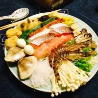 Stacked: The platter includes salmon, hamaguri clams, vegetables, chicken, tofu and kuruma-ebi king prawns. | ROBBIE SWINNERTON