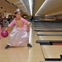 Bowled over: Tokyo Dome City\'s bowling alley has gutter bumpers to help kids build confidence bowling. | JASON JENKINS
