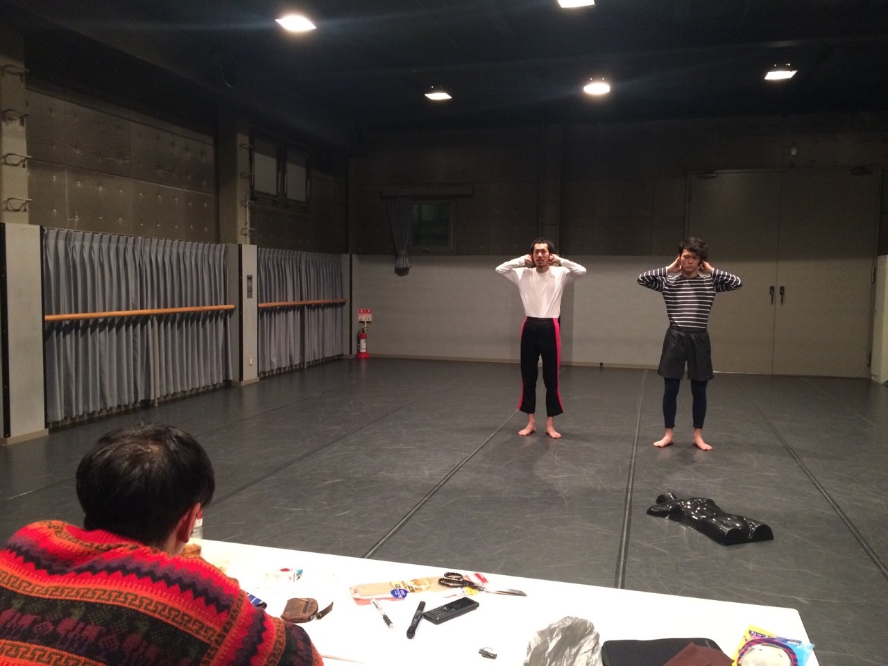 Back story: Yudai Kamisato (left) leads a rehearsal for '+51 Aviacíon, San Borja.' | NOBUKO TANAKA