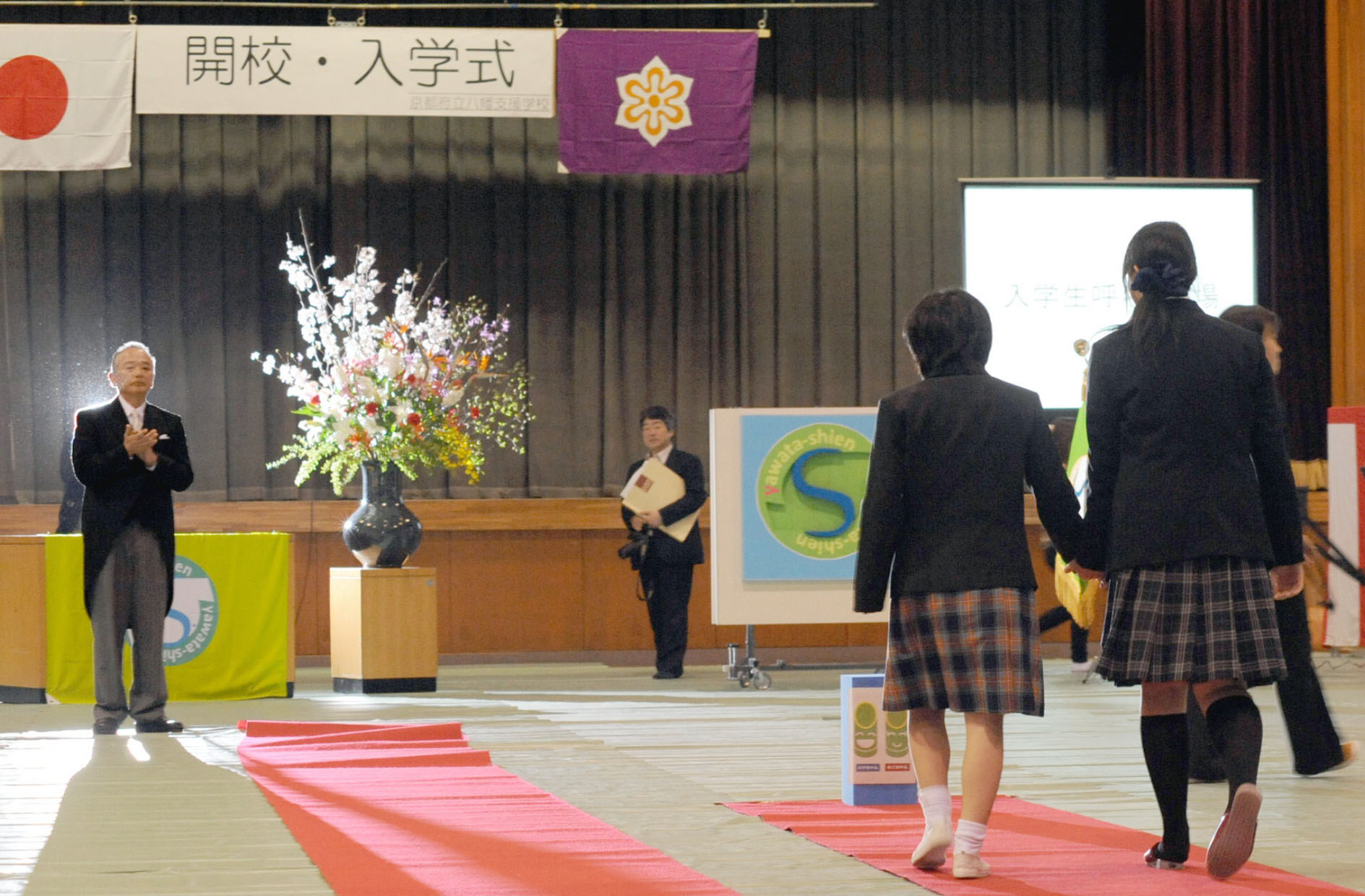 Pearly gates: A high school entrance ceremony heralds the end of the ordeal known as juken jigoku, or entrance-exam hell. | KYODO
