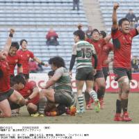 Student uprising: Teikyo University players celebrate their 31-25 win over NEC Green Rockets in the All-Japan Championship on Sunday. | KYODO