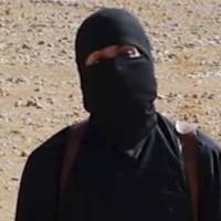 A screen shot shows Mohammed Emwazi, known as \"Jihadi John,\" from a video released Oct. 3, 2014, by Islamic State militants. | AP