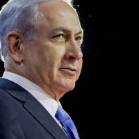 Benjamin Netanyahu, Israel\'s prime minister, pauses while speaking during the American Israel Public Affairs Committee  policy conference at the Washington Convention Center in Washington, D.C., U.S., on March 2, 2015. He denied reports that he has backed away from seeking a two-state peaceful solution with the Palestinians. | BLOOMBERG