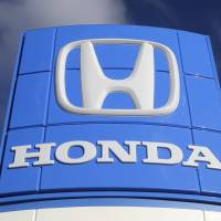 A sign at a Honda dealership in Miami Lakes, Fla. Honda announced on Thursday that it is launching an unprecedented U.S. ad campaign urging owners to get vehicles repaired if they have been recalled to fix defective air bags. | AP