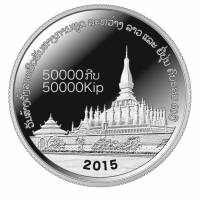 The silver coin to commemorate 60 years of Japan-Laos diplomatic ties bears an image of Pha That Luang, a Buddhist stupa in the capital of Vientiane. | KYODO